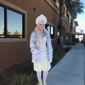 White faux fur coat